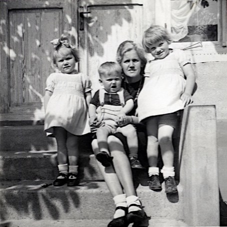 Carly's grandma, Antjie, stands to the far right as a youth with her mom, Charlotte, brother, Roland, and sister, Ilsa.