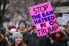 People protesting to impeach Trump.