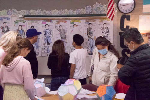 Students bring their parents to their classrooms to show off all the achievements throughout the year.