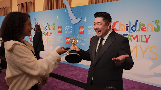 Makayla at the Emmys interviewing Eric Bauza, the voice of Bugs Bunny, winner of the Outstanding Voice Performance in an Animated Program.