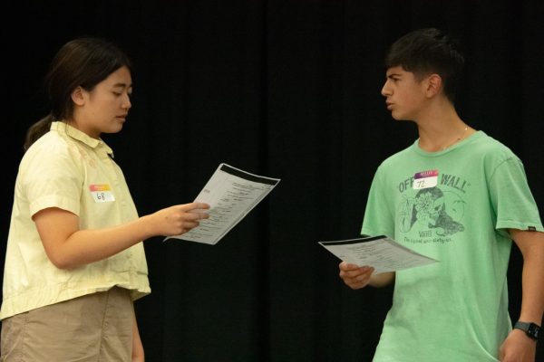 Two 8th grade students, Victoria G. and Jacob R., are performing their auditions for the Peter Pan Jr. play happening at Day Creek.