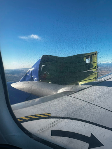 The engine cover of a Boeing 737-800 blowing in the wind taken by a passenger 
