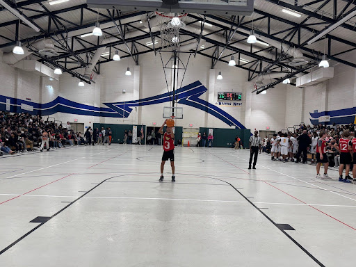 Day Creek student Jacob W. attempts to regain points during free-throw.