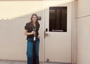 Mrs. Brumbaugh in front of her new 7th grade classroom. 