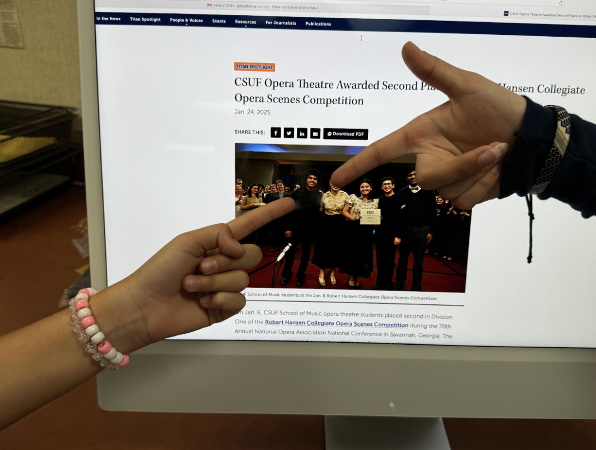 Pointing out success! Current students recognize Miles’ CSUF Opera Theatre’s second place win at the Robert Hansen Collegiate Opera Scenes competition.