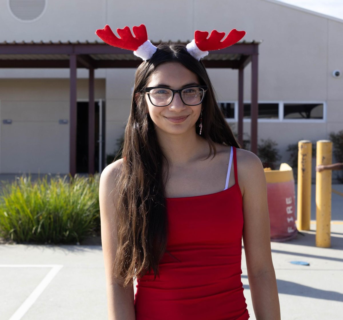 Seventh grader Victoria A. shows her red Moose inspired outfit.