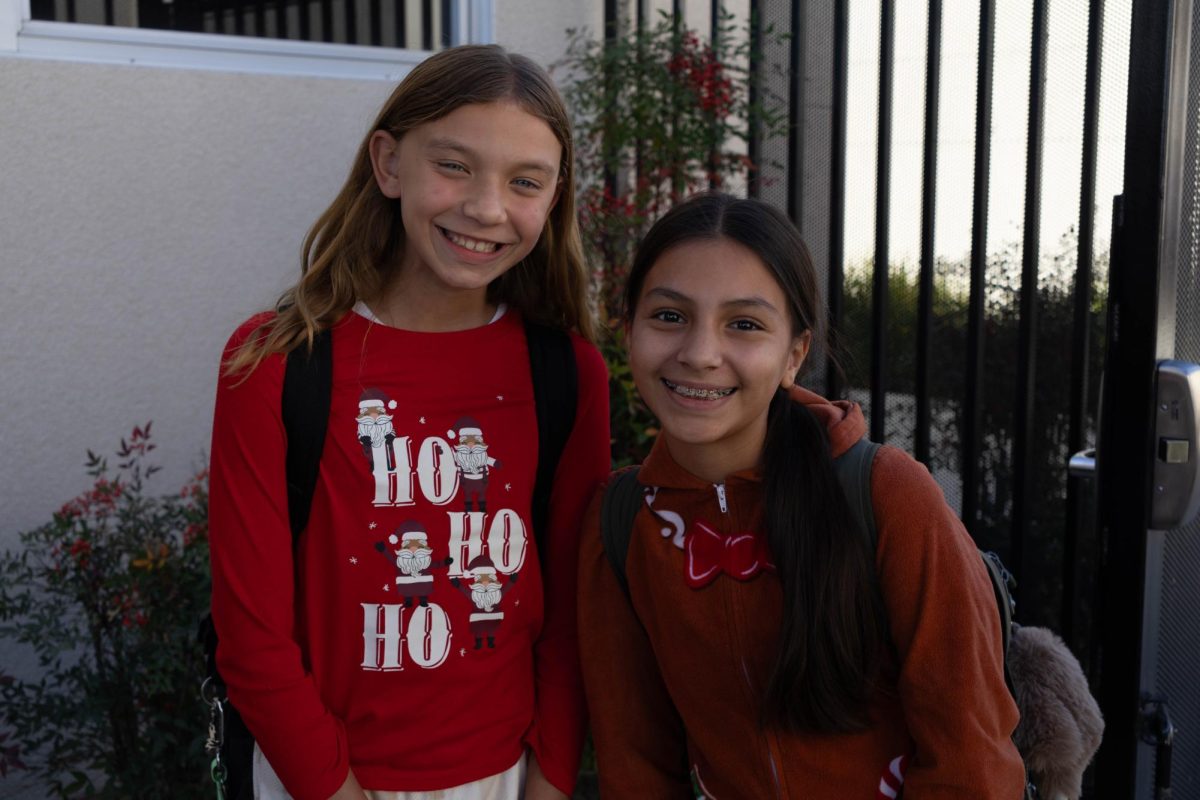 Emma A. and Zaia V. pose together.