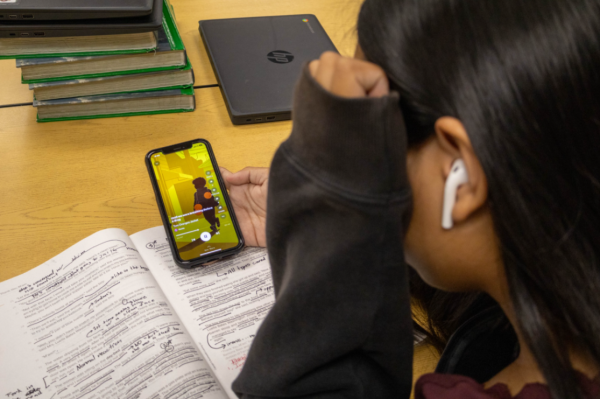 A student experiments with Suno, an AI music generator, to transform notes and ideas into an original song.